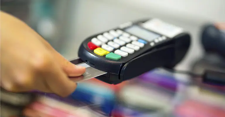 Paying for a purchase using a credit card reader