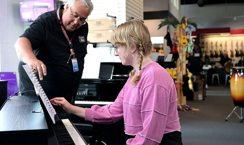 Staff with Customer Clavinova Staff with Customer Clavinova