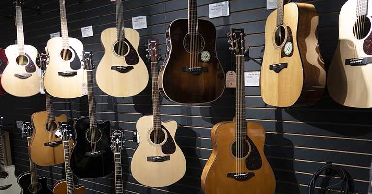 Acoustic guitar display in the West Bend White House of Music store