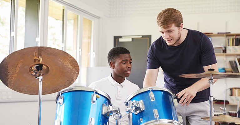 Instructor and Drum Student