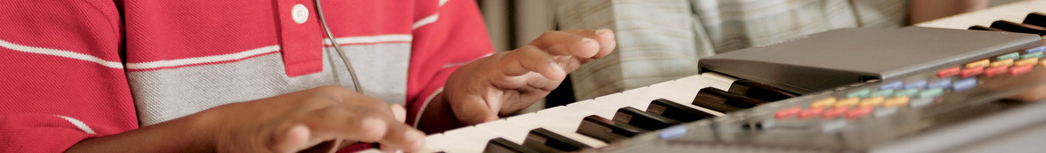 Students playing keyboards