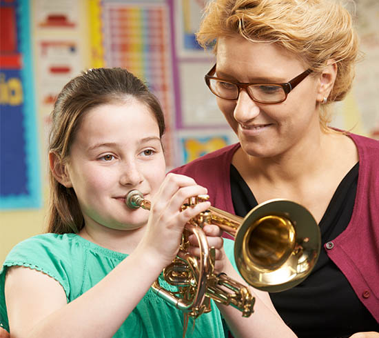 Brass Student learning with instructor